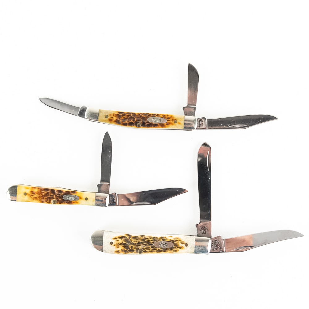 3 Assorted Case XX Collector Knives (2000s): 3 Case XX USA collector knives. 3 different models, 6344SS, 6207SS, and 6225 1/2 SS. All are early 2000s production and are in like new condition with only minor storage wear on bolsters. 2 Different