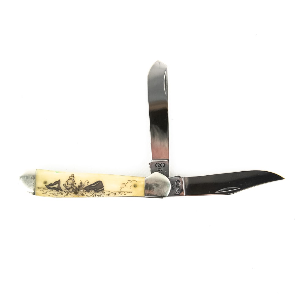 Case XX 6200 Moby Dick Scrimshaw (1997): Case XX Model 6200 Moby Dick Scrimshaw Knife. 1997 date on blade. Elaborate Whale hunting scene carved in handle. Knife is in like new condition. Bolsters have minor wear from storage. Scrimshaw bone