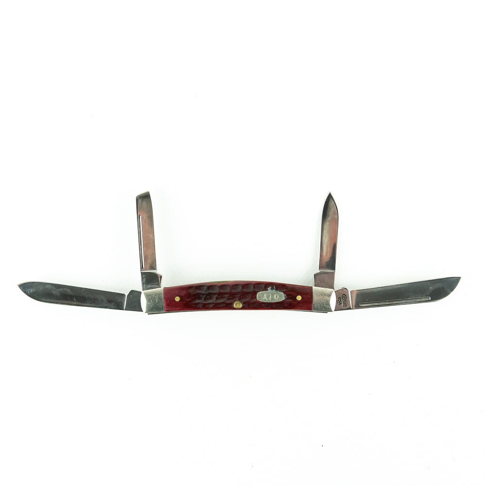 Case XX 64052 Bone Congress knife (1997): Case XX Model 64052 Red Bone Congress knife. High quality, USA made, 1997 production knife is like new with only minor storage wear on bolsters. Excellent collector item. 3.5" closed length. See photo