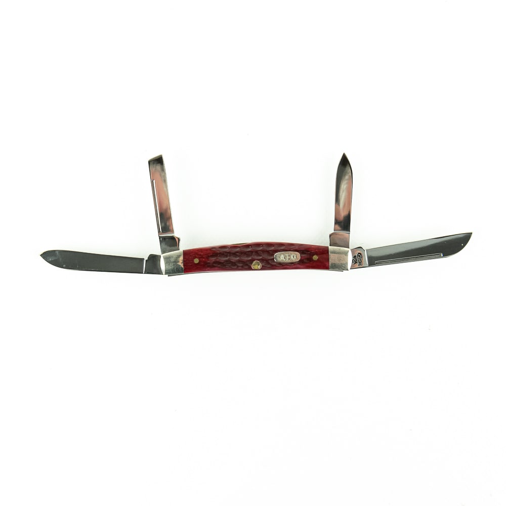 Case XX 64052 Bone Congress knife (1997): Case XX Model 64052 Red Bone Congress knife. High quality, USA made, 1997 production knife is like new with only minor storage wear on bolsters. Excellent collector item. 3.5" closed length. See photo