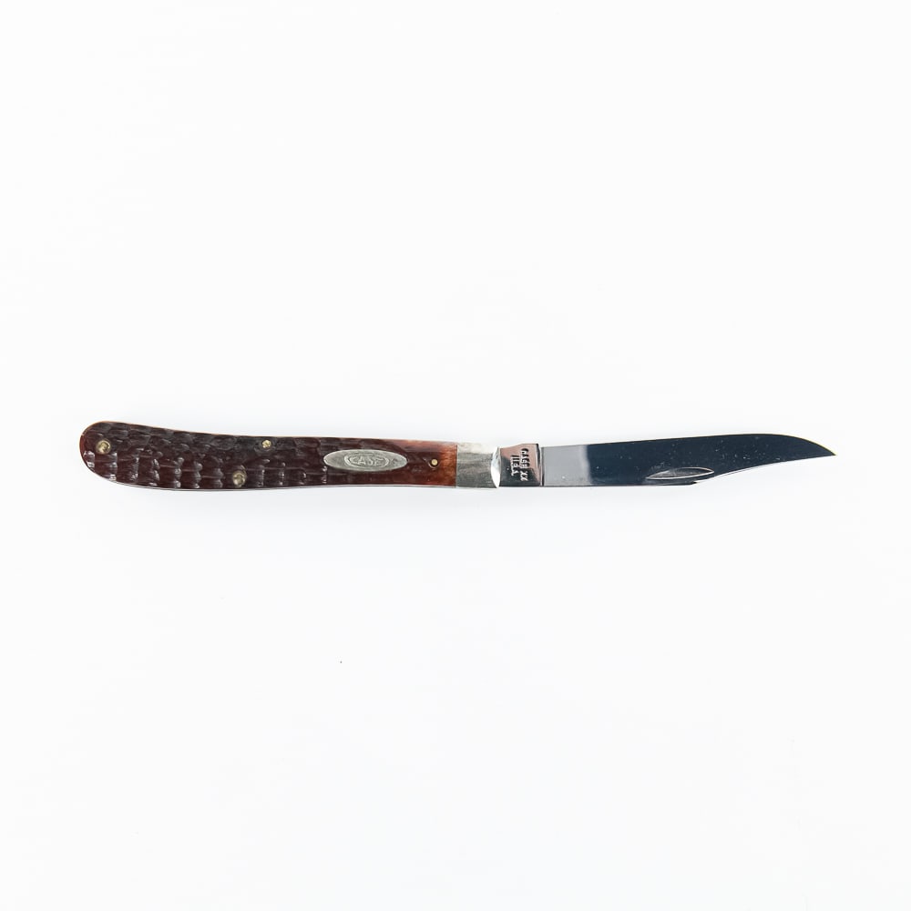 Case XX 61048 Slimline Trapper Knife (1965-1969): Case XX Model 61048 Slimline Trapper knife. Red Bone handle knife is like new with only storage wear on bolsters. Blade is still factory razor sharp. Vintage knife is date stamped for 1965-1969 on bla