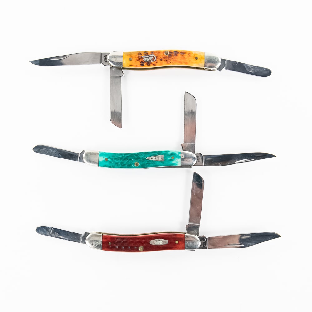 3 Case XX 6318 SS Stockman Knives (2000s): 3 Case XX Model 6318 SS Stockman Knives. All are early 2000s Production and are in like new condition with only minor storage wear on bolsters. 3 Different colors of bone handles, red, orange and gree