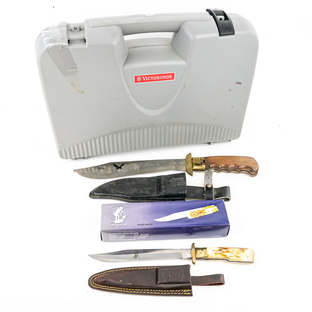 2 Folding Bowie Knives: 2 Imported folding bowie style knives. One is good condition and the other is brand new condition. 2 different decoration and blade styles. Lengths range from 16-19" overall. Knives come with factory