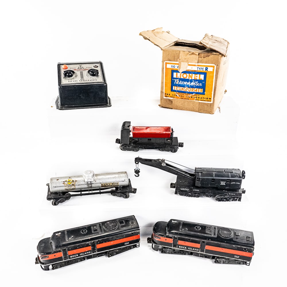 Lionel 2031 Rock Island Twin Locomotive Pair &More: Postwar Lionel 2031 Rock Island Alco A-A Diesel locomotive pair, 3559 Coal Dump, 2460 Crane car, Sunoco Tanker and Lionel type R trainmaster transformer with box (plus and lights up otherwise untested