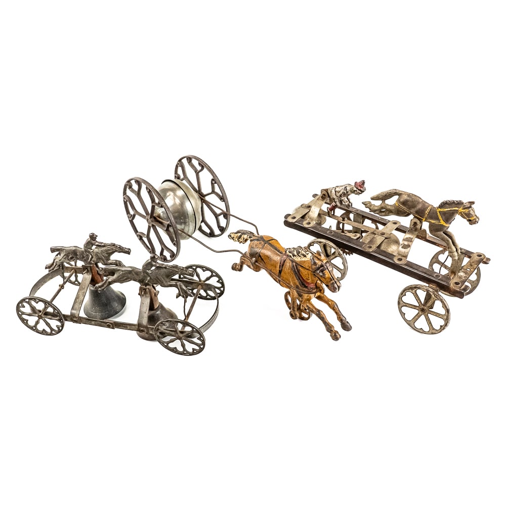 Scarce Watrous Iron Clown & Horse Bell Pull Toys: Scarce Watrous iron clown & horse bell pull toy in good overall condition; 9" metal double bell horse race toy, missing reigns wheels move freely along with 14" American made cast iron horse bell toy.
