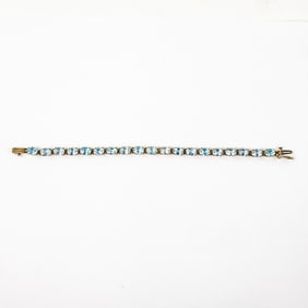7" 10K Yellow Gold Aquamarine Tennis Bracelet