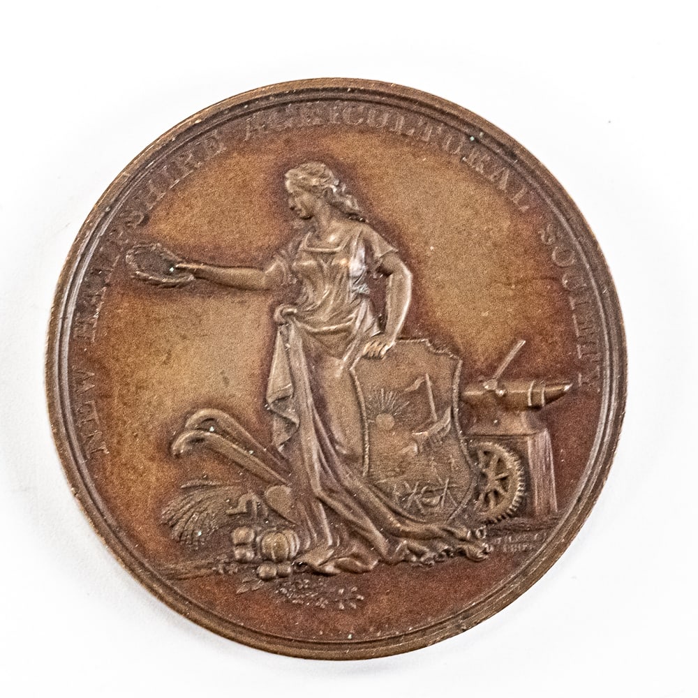 1877 New Hampshire Agricultural Society Medal: Hard to come by 1877 New Hampshire Agricultural Society US Mint Medal. This bronzed copper award medal was struck by the United States Mint in Philadelphia and signed by William Barber and Herrick. Pe