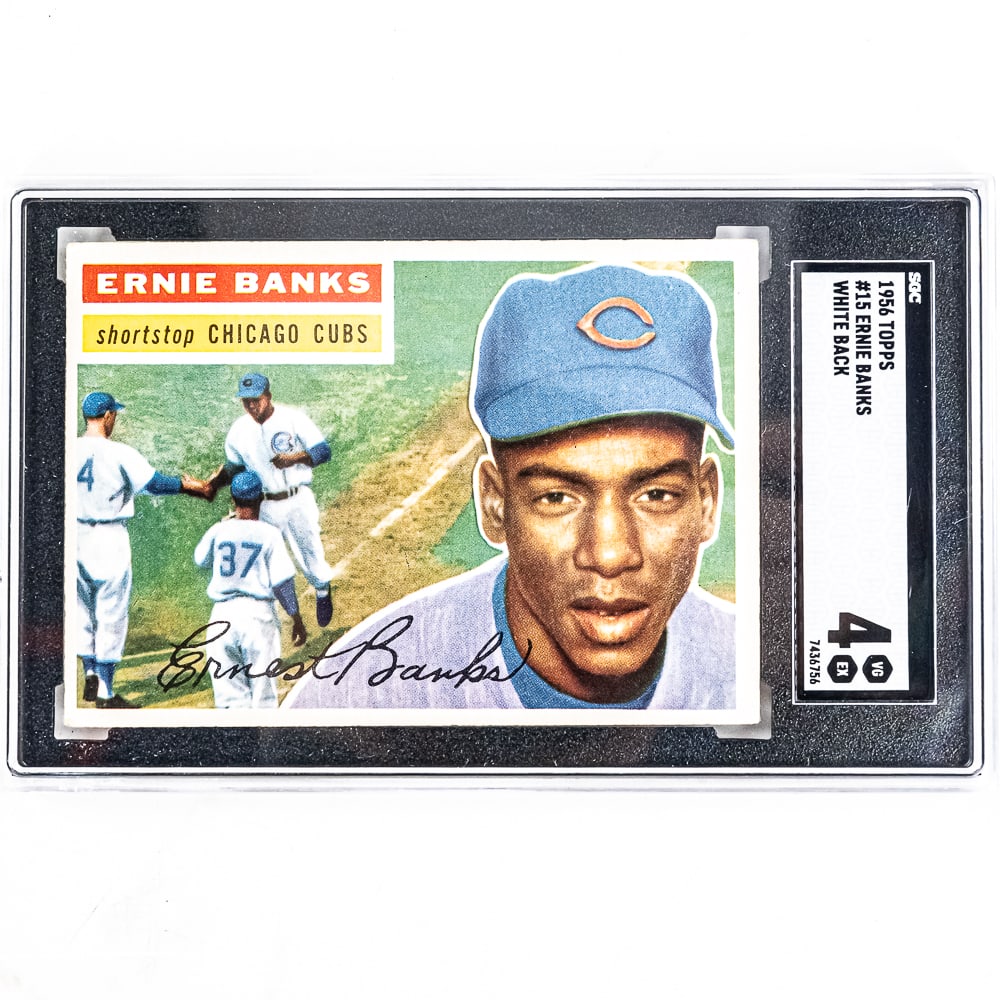 1956 Topps #15 Ernie Banks White Back SGC 4: 1956 Topps #15 Ernie Banks white back, SGC slabbed and graded 4. A must have card for any collector, great gift idea. Perfect addition to your collection, please use photo to judge condition and bid a