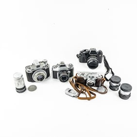 4 Misc. Cameras with lens & timer Leica, Kodak...