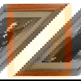 Large Framed Edison Photograph Dealer Display: Large Framed Edison Photograph Dealer Display, fabulous large photograph of Thomas Edison standing with cigar in his hand in original oak frame and matte, original paper seal on back is untouched
