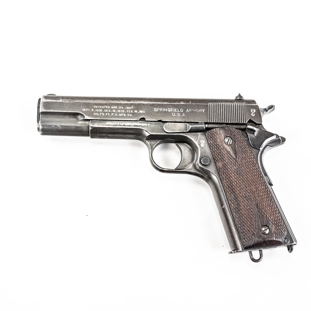 RARE! 1915 WWI Springfield 1911 .45acp Pistol (C): RARE! "1915" WWI Springfield 1911 .45acp Pistol in very good condition with light wear, 85-95% finish left. The bore is very good! There is a flaming bomb on the slide and the frame, Left side of the 