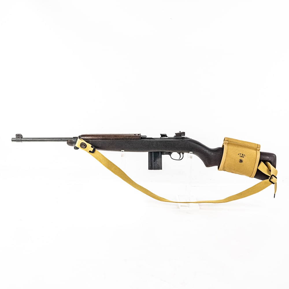 Plainfield M1 Carbine .30 Rifle (C) 50590: Plainfield M1 Carbine .30 Rifle in good condition with wear. The bore is bright and sharp. Comes with a magazine pouch (JT&L 1942), nylon sling and 1x magazine. C&R Eligible S/N:50590