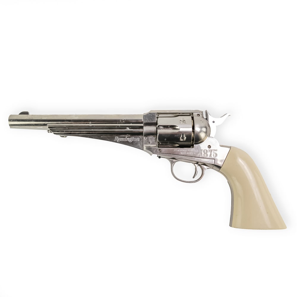 Crosman Remington 1875 Revolver Air Gun: Crosman produced licensed copy of Remington 1875 Revolver. This CO2 powered air gun uses metal shell inserts to hold pellets/BBs and functions just like the real firearm for loading and unloading. Gre