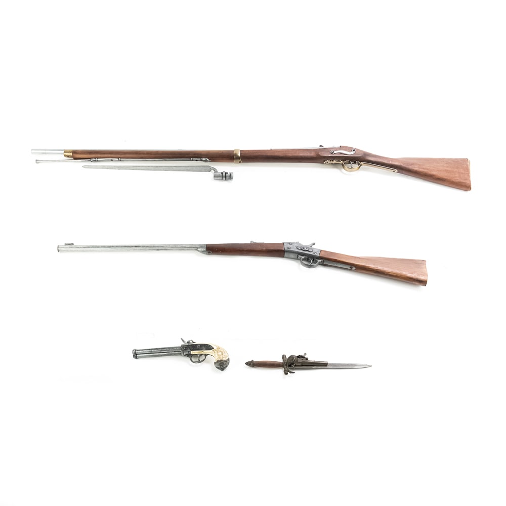 4 Denix Replica Firearms: 4 Denix Spanish made replica firearms. 1 Remington rolling block target rifle, 1 British Rev War Brown Bess musket with bayonet, 1 triple barrel flintlock pistol, and 1 flintlock/dagger pistol combo.