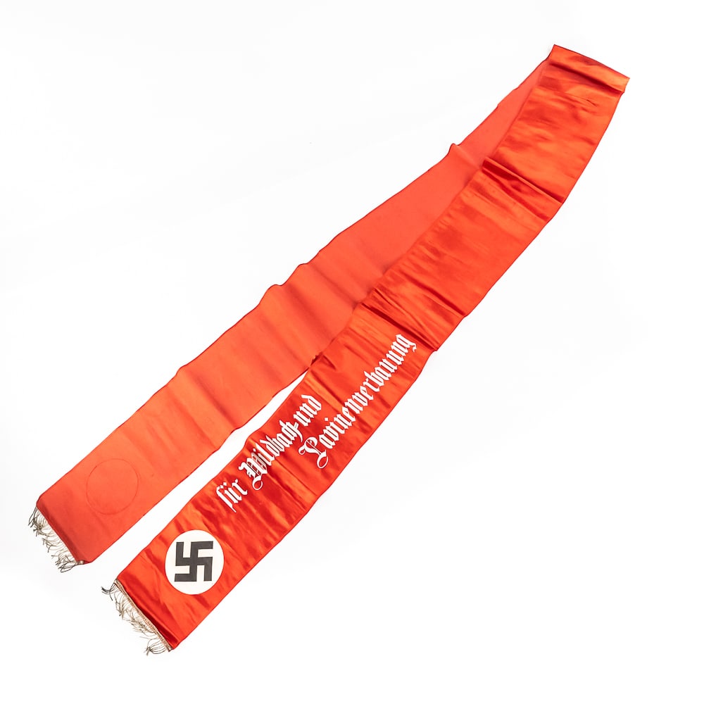 WWII German Remembrance Banner Avalance Control: Ceremonial sash or banner dedicated “To the Loyal Employees of the Salzburg Outpost for Torrent and Avalanche Control.” Silk w/ bullion fringe on either end. Printed silver words on either