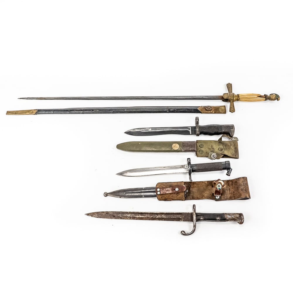 Mixed Group of Blades: 1) Knights of Columbus sword. 27" blade, broken grip. Overall fair condition with scabbard. 2) Spanish 1969 CETME bayonet and scabbard. Good used condition. Bold blade with checkered grips. 3) Swedish