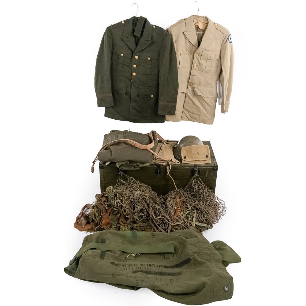 WWII US Uniform-Camo Net Cover-Scrim Roll Lot: This WWII lot includes 1) 1943 dated British navy helmet with leather neck flap, 2) 1 camo net 10'x10 and 3) 1 camo net with scrim 8'x4', 4-5) 2 pairs Army wool trousers 34x31 and 31x31. 6) 1942 dated