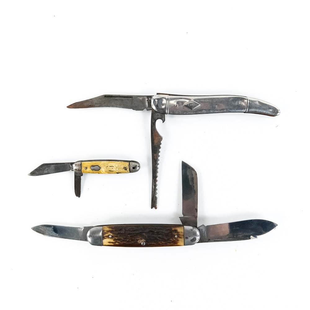 3 Antique Imperial Cutlery Pocket Knives: 3 1940s-1950s era Imperial Cutlery USA made pocket knives. 1 Pen knife, 1 metal handle fish knife, and 1 bone handle Camp knife. Pen knife and fish knife blades are well worn and damaged from use. Cam