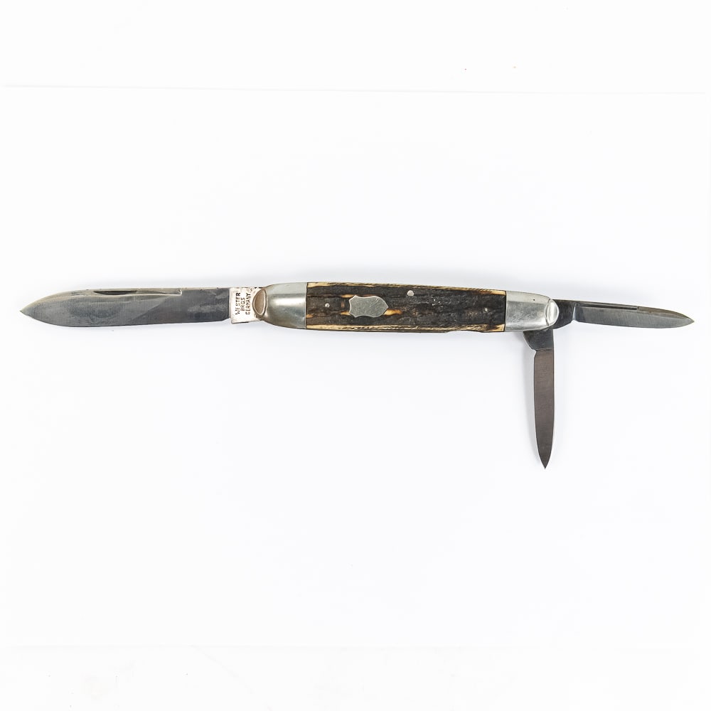 Wester Brothers Germany Whittler Knife: Vintage Wester Brothers German made large Whittler knife. Real bone handled 3 bladed whittling knife is in very good condition aside from one end which has some odd chemical damage. Blades are brand n