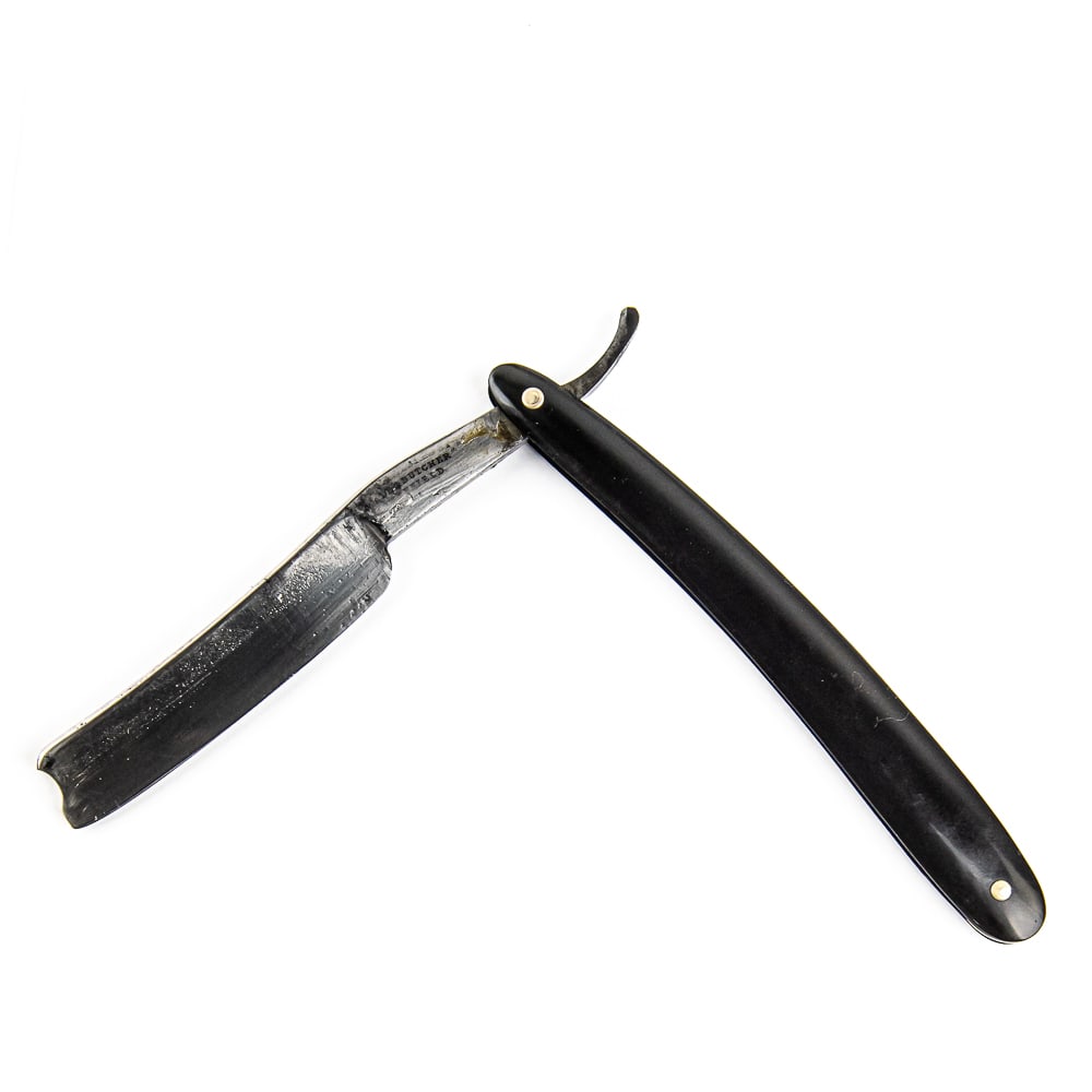 Wade & Butcher Straight Razor: Vintage Straight Razor by Wade & Butcher, with black plastic scales. The face is blank, Tang reads "Wade & Butcher Sheffield", and reverse is blank. Blade is in overall pristine condition, with nice l