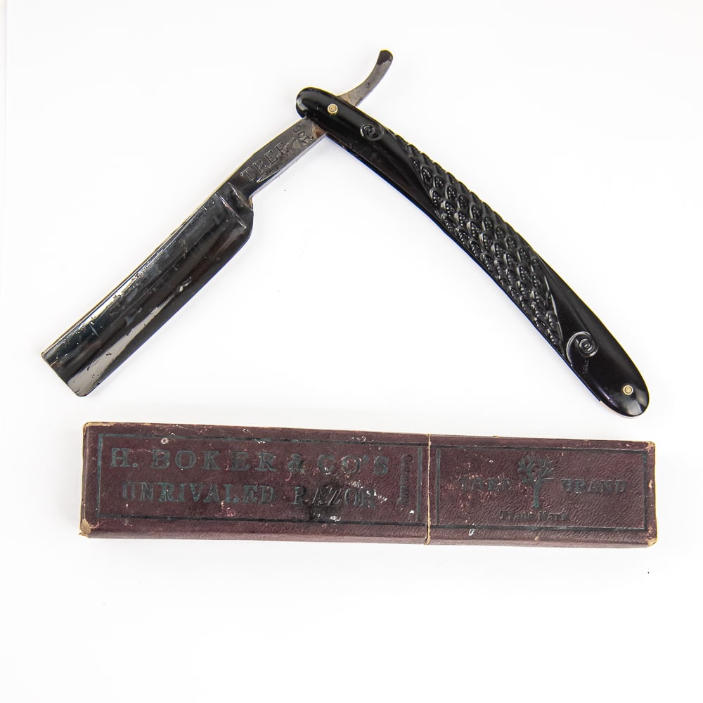 H. Boker & Co Tree 106 Razor w/ Orig. Box: Vintage Straight Razor "Tree" by H. Boker & Co , with black plastic scroll-theme scales. The face is blank, Tang reads "TREE" with "106", and reverse reads "H. Boker & Co Germany" with tree logo. Blad