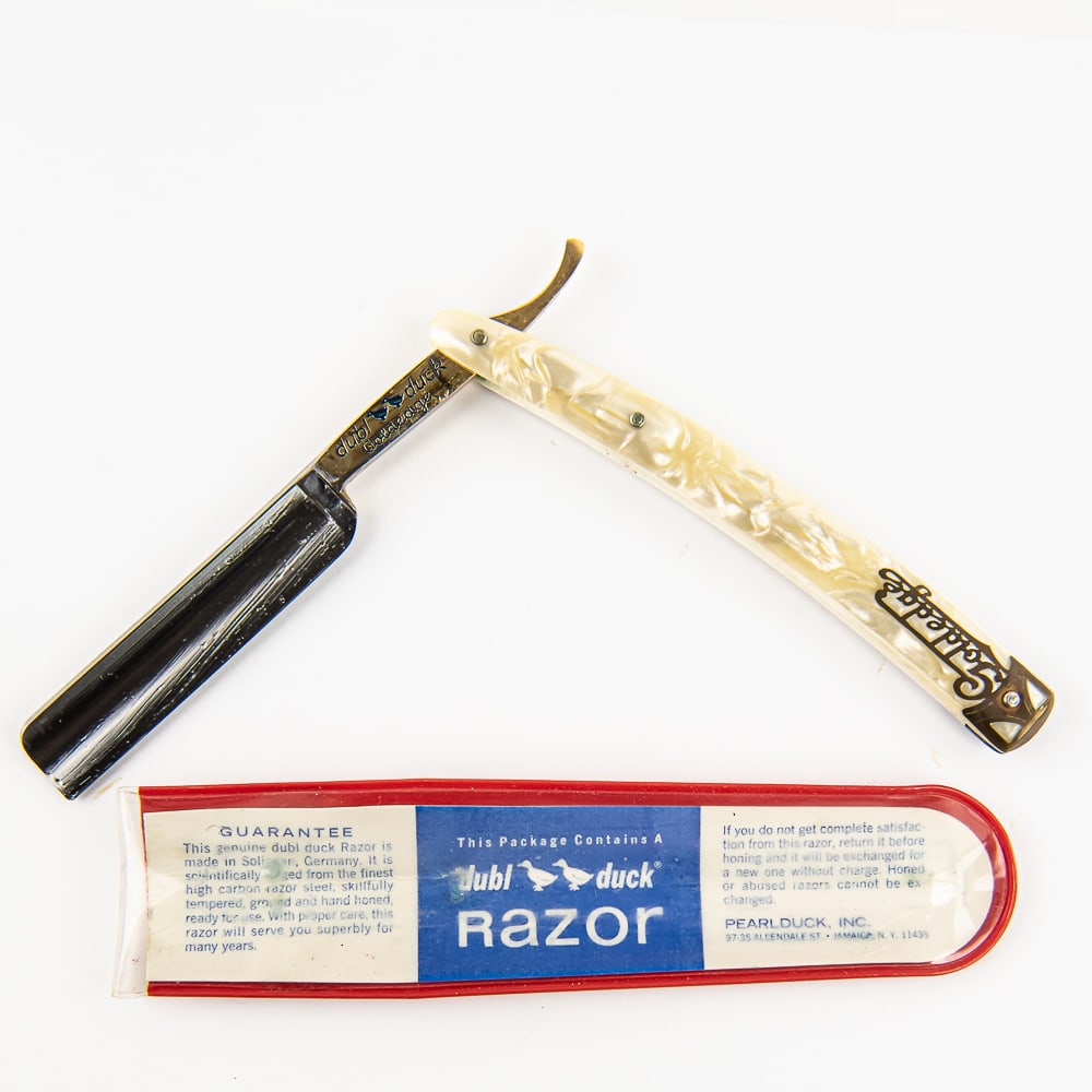 dubl duck Goldedge Razor w/ Original Pouch: Vintage Straight Razor "Goldedge" by Dubl Duck, with pearly scales that have "Goldedge" along with metal cap near wedge pin. The face is blank, Tang is golden colored and reads "dubl duck Goldedge" wi