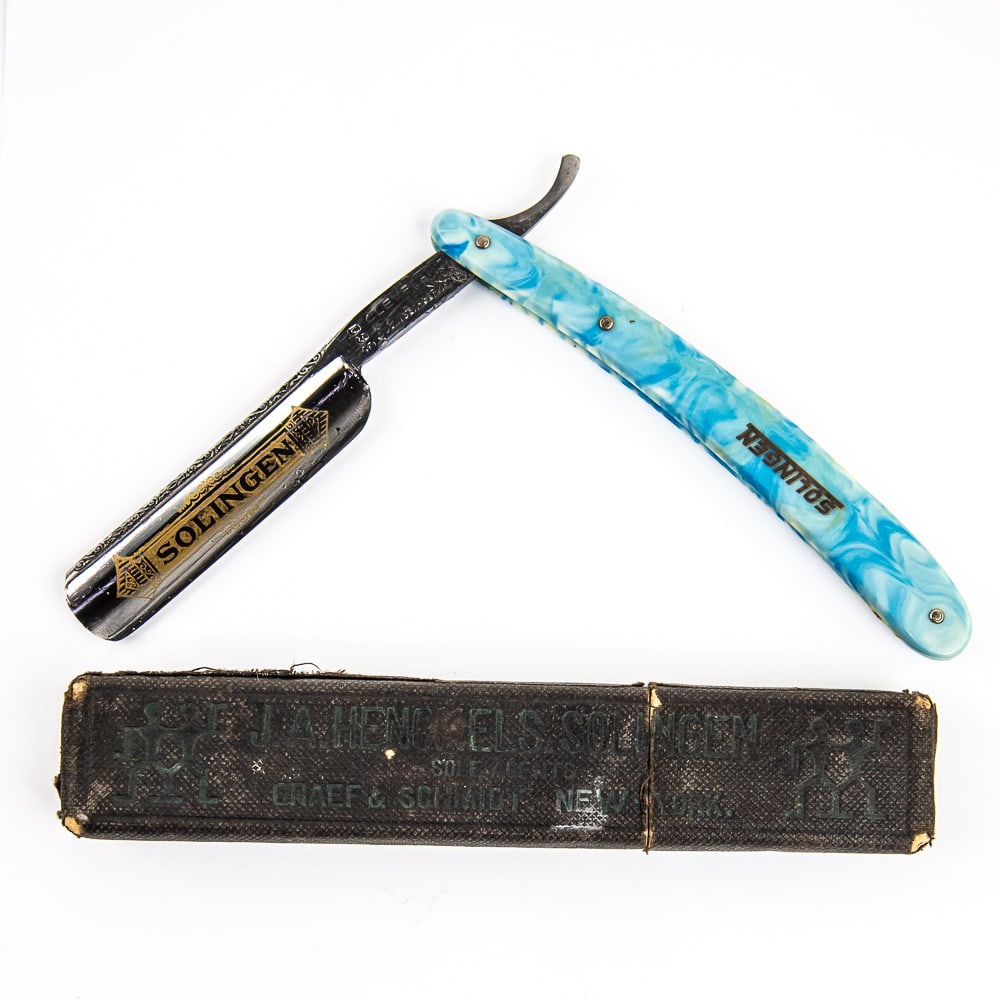 Cleveland Cutlery Co 360 w/ Unorig. Box: Vintage Straight Razor by Cleveland Cutlery Co, with blue/white swirl plastic scales. The face reads 'Solingen" with golden graphic, Tang reads "Cleveland Cutlery Co 360", and reverse is blank. Blade