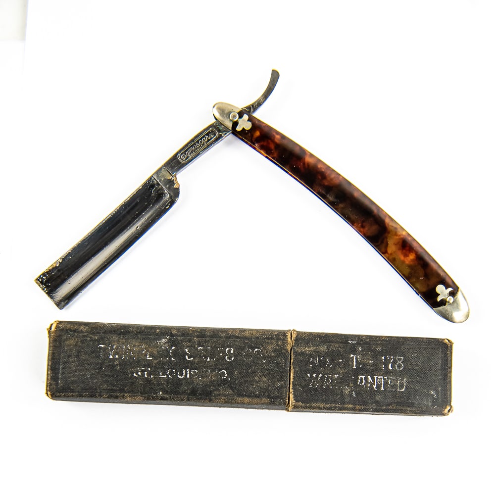 Demascara Razor w/ Unorig. Box: Vintage Straight Razor "Demascara", with brown/yellow celluloid scales with metal caps on ends. The face is blank, Tang reads "Demascara Fremont, O.", and reverse is blank. Blade is in overall pristin