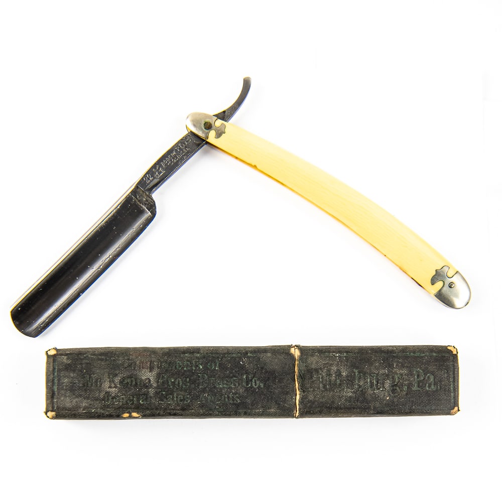 Robert Klaas 22 w/ Unoriginal Box: Vintage Straight Razor "22", with yellowed celluloid scales and metal caps on ends. The face is blank, Tang reads "22 Robert Klass Solingen" w/ logo, and reverse is blank. Blade is in overall great co