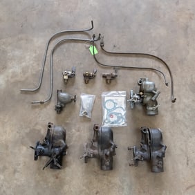 3 Zenith Carburetors, 1 Tillotson Carb
