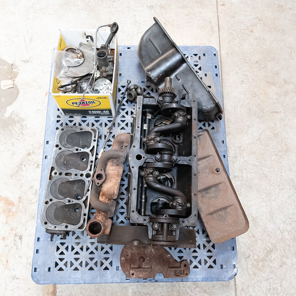 Model A Ford Engine Block, Crank, Head, More: Due to the size/weight/fragility of this item, it will require a pick up or customer-arranged 3rd-party shipping. We will connect you with reputable transport companies after the auction. Lot includes