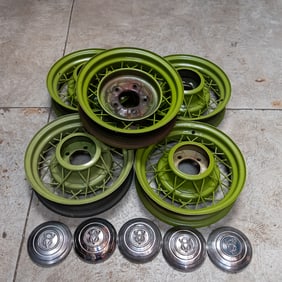 Five 1935 Ford Model A Wire Rims & Hub Caps