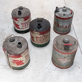 5 Vintage Wolf' Head Motor Oil Cans