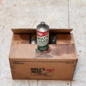Case of Vintage Wolf's Head Outboard Motor Oil