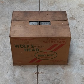 Case of Wolf's Head 40w Oil in Vintage Cans