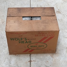 Case of Wolf's Head 40w Oil in Vintage Cans