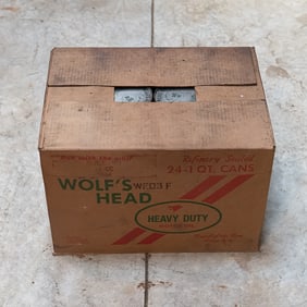 Case of Wolf's Head 40w Oil in Vintage Cans