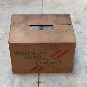 Case of Wolf's Head 40w Oil in Vintage Cans