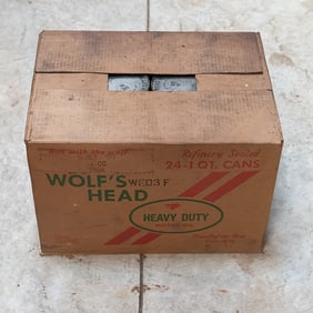 Case of Wolf's Head 40w Oil in Vintage Cans