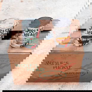 Wolf's Head 40w Oil in Vintage Cans: 18 cans of Wolf's Head 10w & 40w motor oil in vintage cardboard cans. See pics