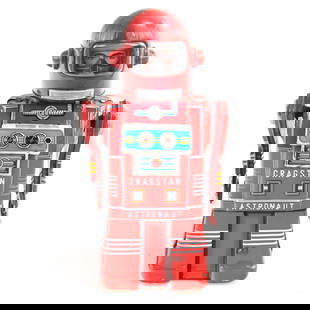 RARE Cragstan Astronaut Robot Wind Up: Unusual crank wheel in rear that activates a friction flywheel that provides about 30-40 seconds of energy. Robot walks, swings arms. Marked "Cragstan Astronaut" on front of chest. Cragstan distribute