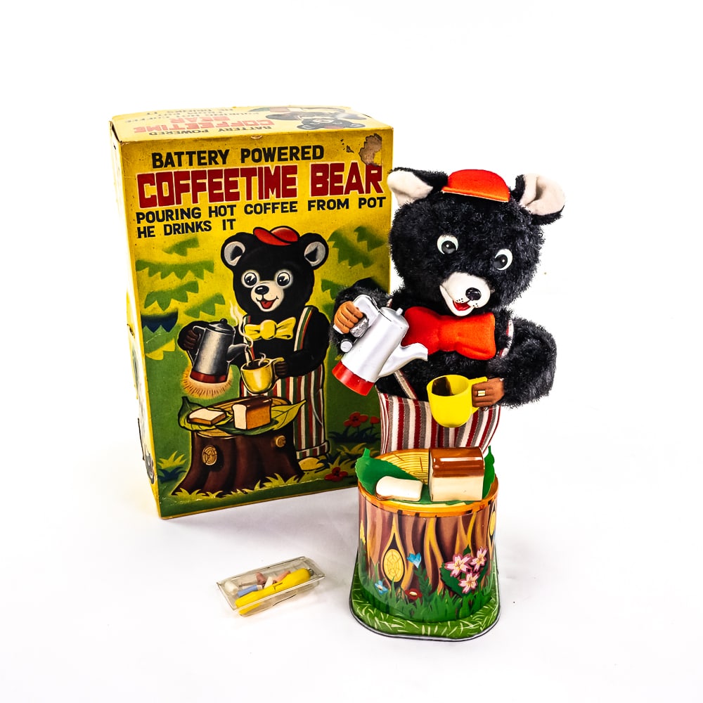 1950s Coffetime Bear Battery Powered Japan Toy: Hard to come by 1950s "Coffetime Bear" battery operated Japan tin toy. Very good overall condition still featured inside original packaging; packaging shows some age and wear. Perfect addition to your
