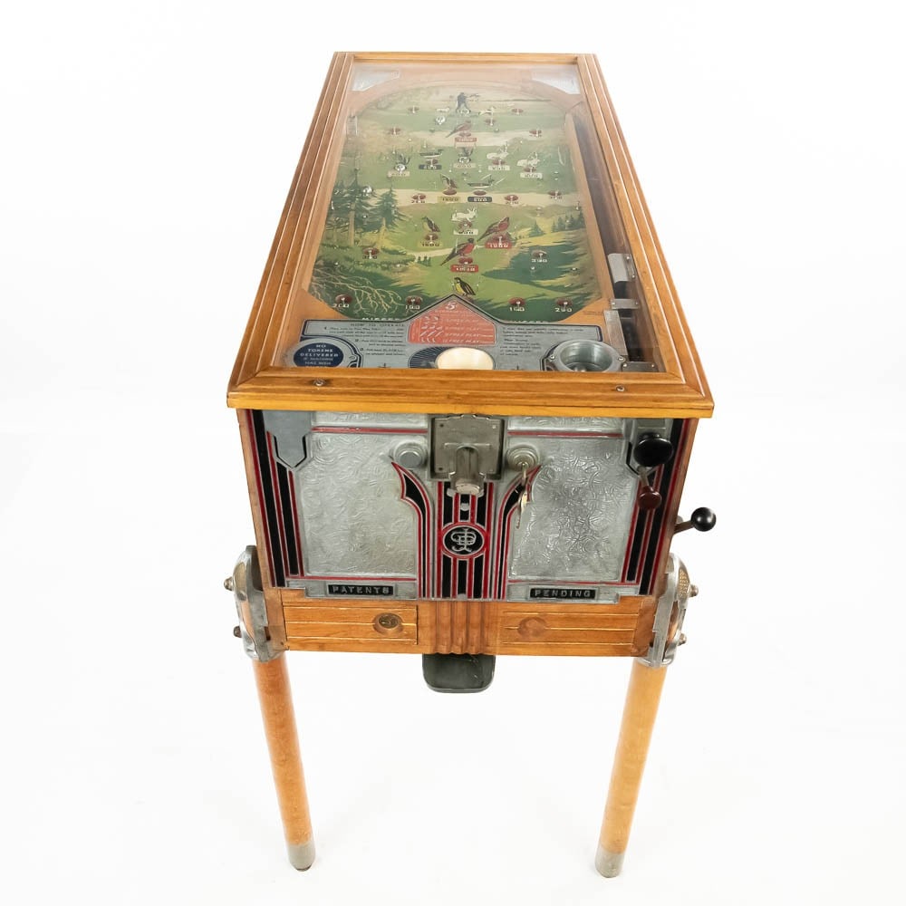 *Jennings "Sportsman" 5 Cent Pay Out Pinball: This is an absolutely beautiful wood rail pinball machine with a hunting theme. A pre-flipper machine manufactured by O.D. Jennings, circa 1935. With this machine, if the ball lands in the right spot 