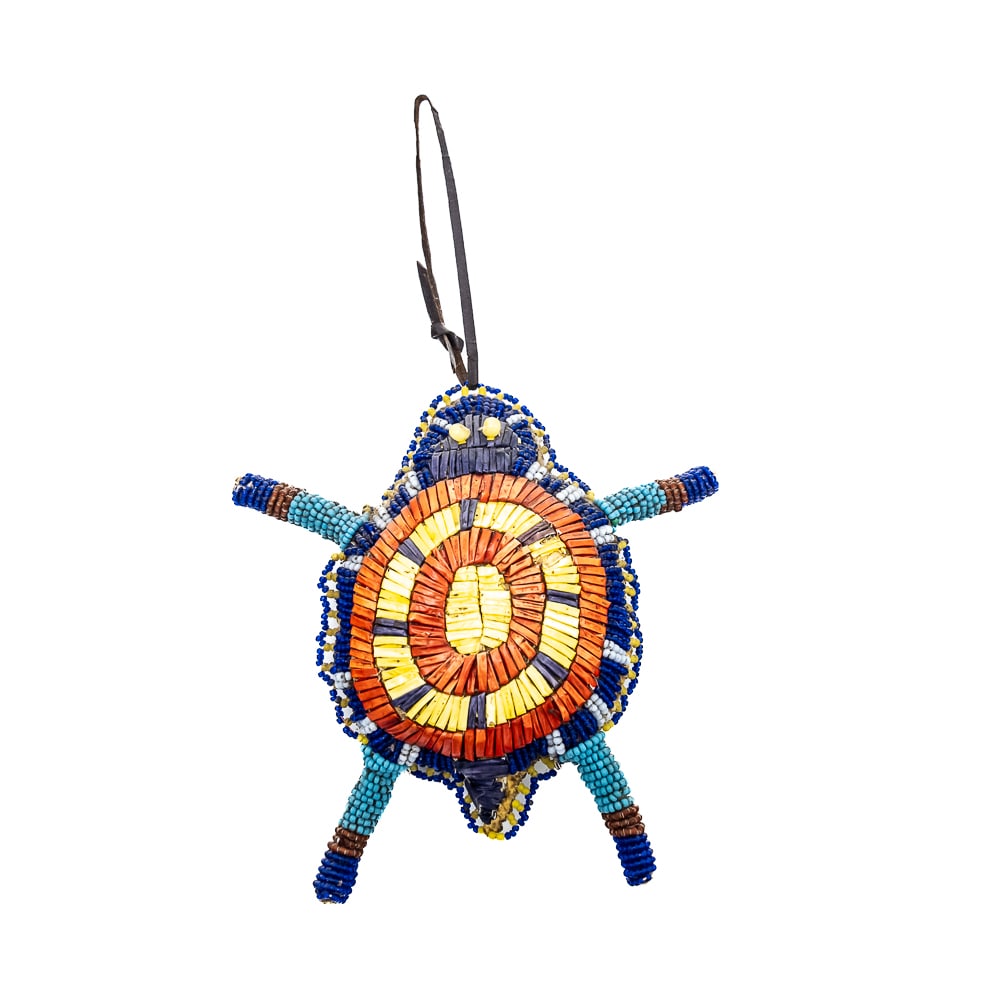 1890s Northern Cheyenne Umbilical Fetish: This is a Northern Cheyenne umbilical cord fetish, circa 1890s. Crafted from tanned hide and adorned with intricate bead and quillwork. The fetish is turtle shaped, a common motif in Native American c