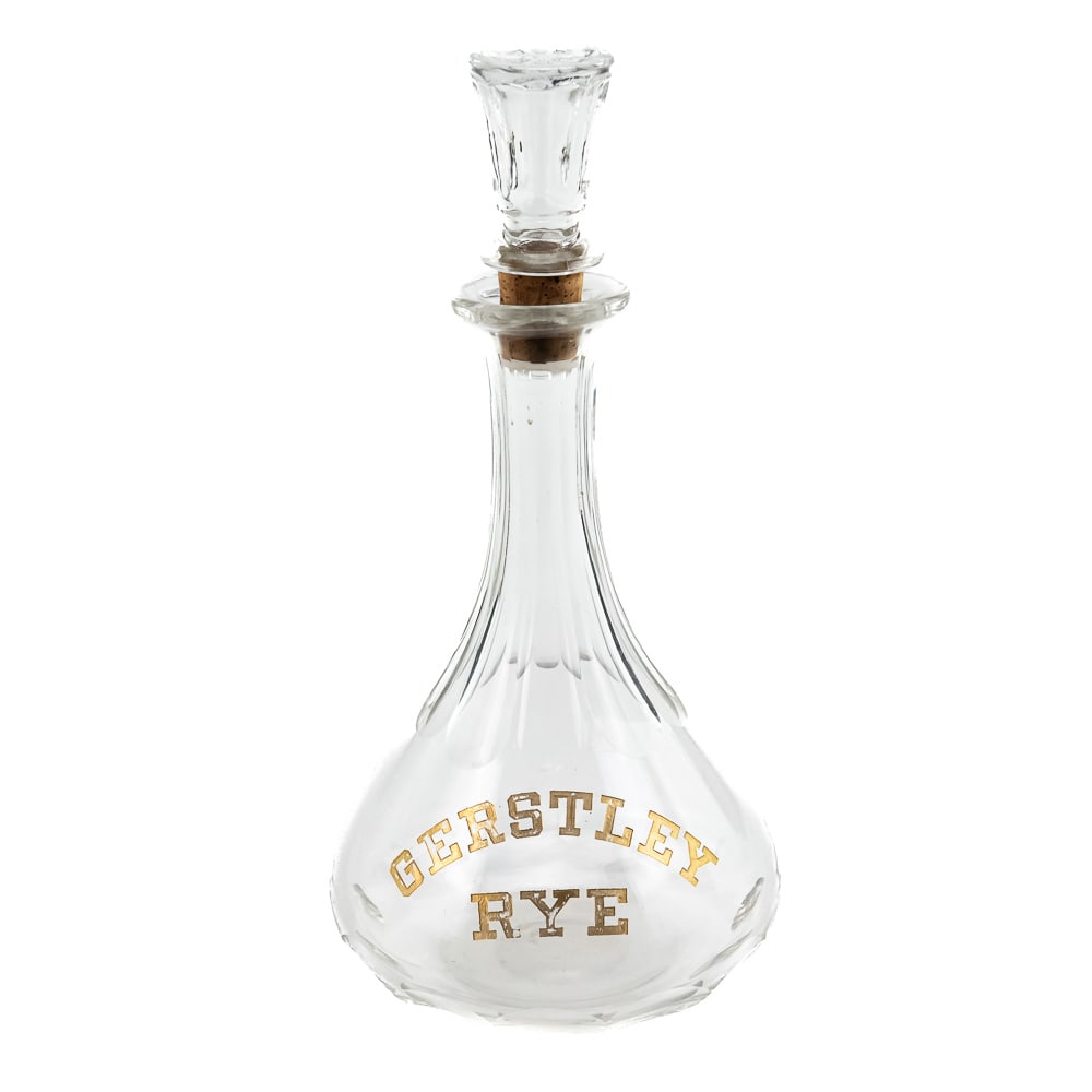 Vintage Gerstley Rye Whiskey Decanter: An early 20th-century, commercial barware decanter for Gerstley Rye. This brand of rectified rye whiskey was produced by Philadelphia-based liquor company Rosskam, Gerstley & Co. Established in 1869,
