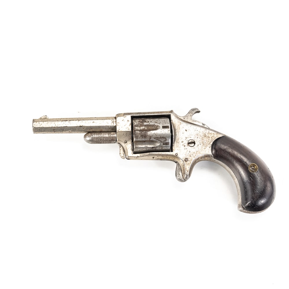 “Favorite” No. 1 Spur Trigger Revolver .22 cal: “Favorite” No. 1 Spur Trigger Revolver. This is a solid frame, single-action, spur-trigger, .22 caliber revolver. It features a 2 ½ -inch octagonal barrel with a 7-shot cylinder. It exhibits a ni