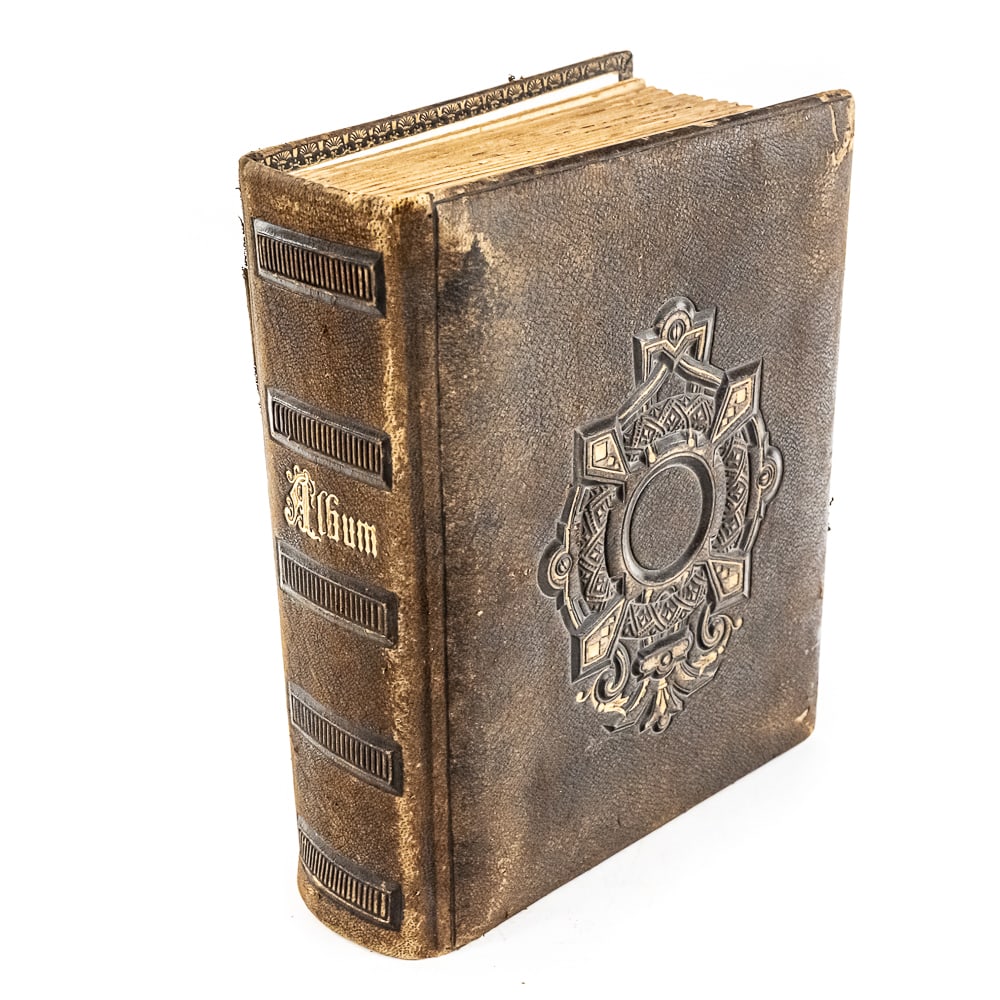 Antique Leather American Photograph Album w Photos: Antique leather American photograph album almost complete with time period Midwest photos. Good overall condition, some photo slots torn; 8.5"t x 7.5". Perfect addition to your collection, please use