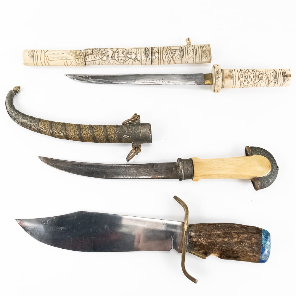 3x Vintage Knives: 3x Vintage Knives: -17" Vintage Japanese Tanto Knife w/Carved Bone Hilt & Scabbard w/ cracked Scabbard, blade has been sharpened -15" Small Middle Eastern Curved Dagger dark oxidized steel, "Gold" wra