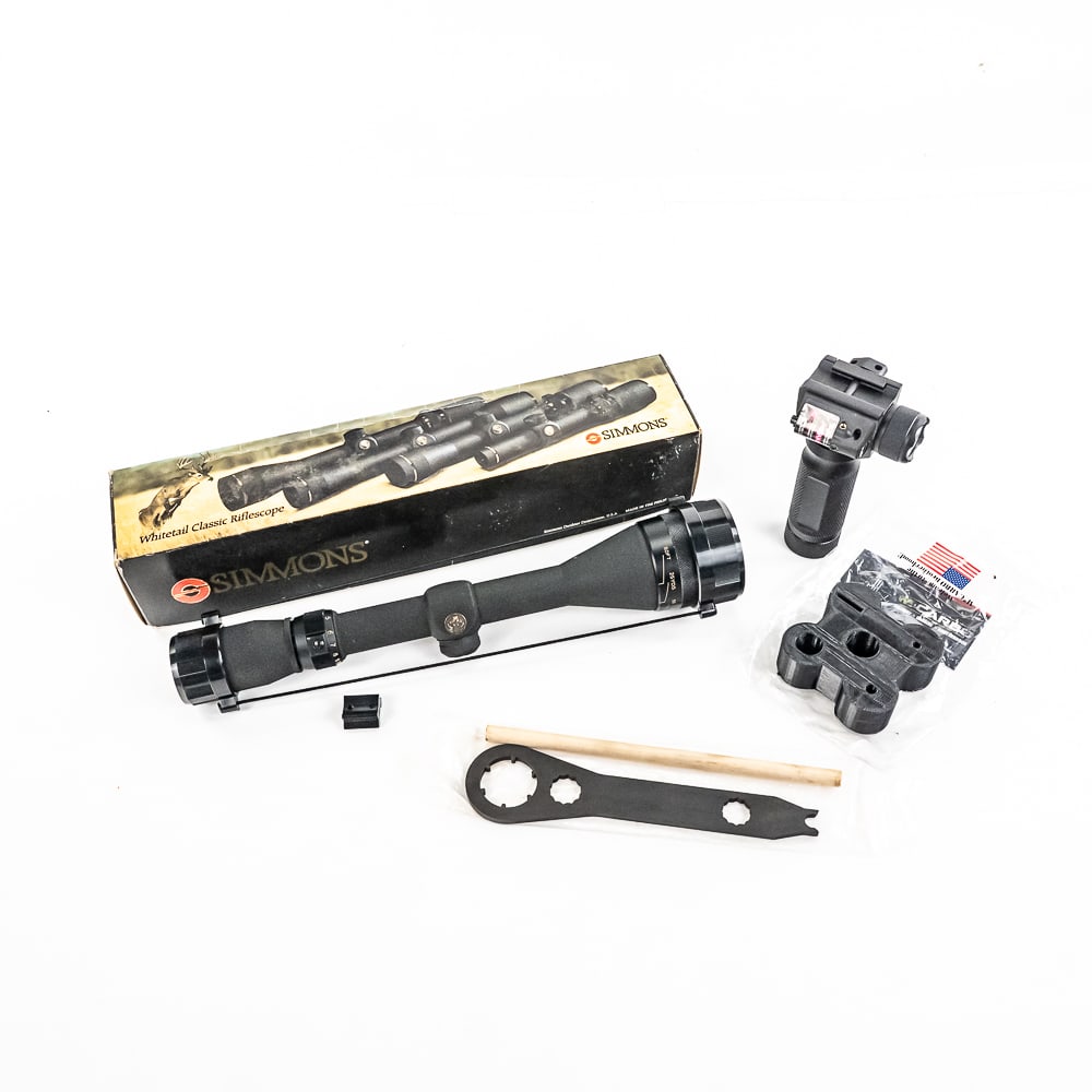 Simmons Whitetail Scope and gun accessories: Nice older Simmons Whitetail Classic WTC-17 Scope. 4-12x44 scope with adjustable objective is like new in original box with papers. Lot also includes imported foregrip light laser combo, and some guns