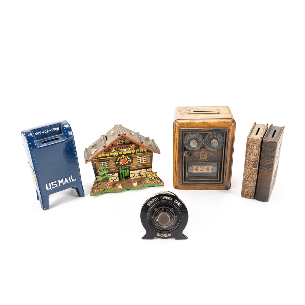 Assortment of 6 Vintage Bank Themed Coin Banks: Vintage coin bank assortment features 6" Post Office Box Bank, 6.5" US MAIL Out of Town ceramic coin bank, 5.5" "Steps to Success & Save & Have Benjamin Franklin Vol. I & IV advertising book banks, 3.